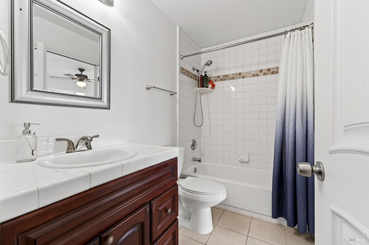 17437 Greenridge Road Hidden Valley Lake, CA 95467 - Photo 18 of 54 a bathroom with a sink a toilet and shower