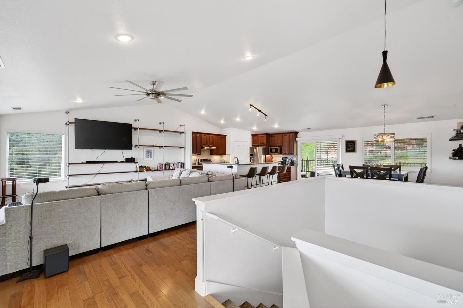 17437 Greenridge Road Hidden Valley Lake, CA 95467 - Photo 20 of 54 a large white kitchen with lots of counter space a sink a refrigerator and a fireplace