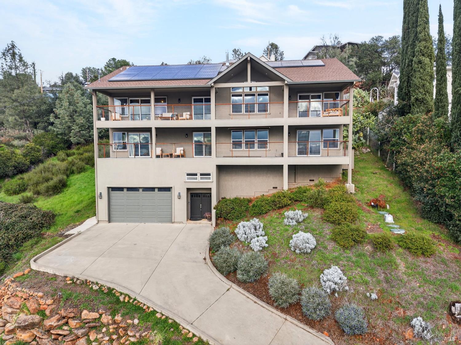 17437 Greenridge Road Hidden Valley Lake, CA 95467 - Photo 2 of 54 a front view of a house with a yard