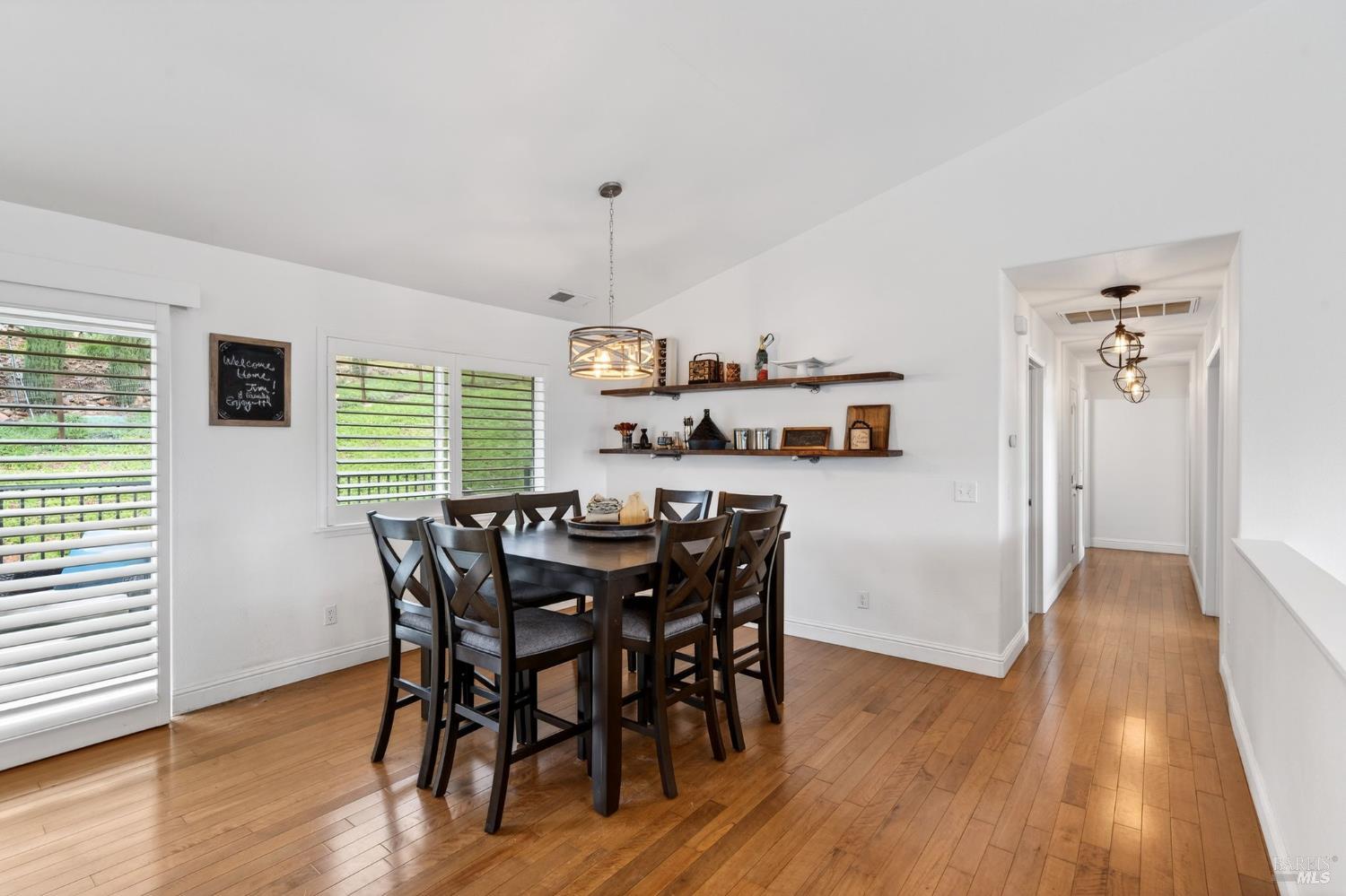 17437 Greenridge Road Hidden Valley Lake, CA 95467 - Photo 23 of 54 a view of a dining room with furniture and wooden floor