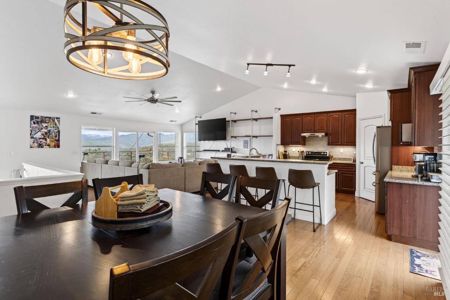 17437 Greenridge Road Hidden Valley Lake, CA 95467 - Photo 25 of 54 a kitchen with a table chairs and appliances