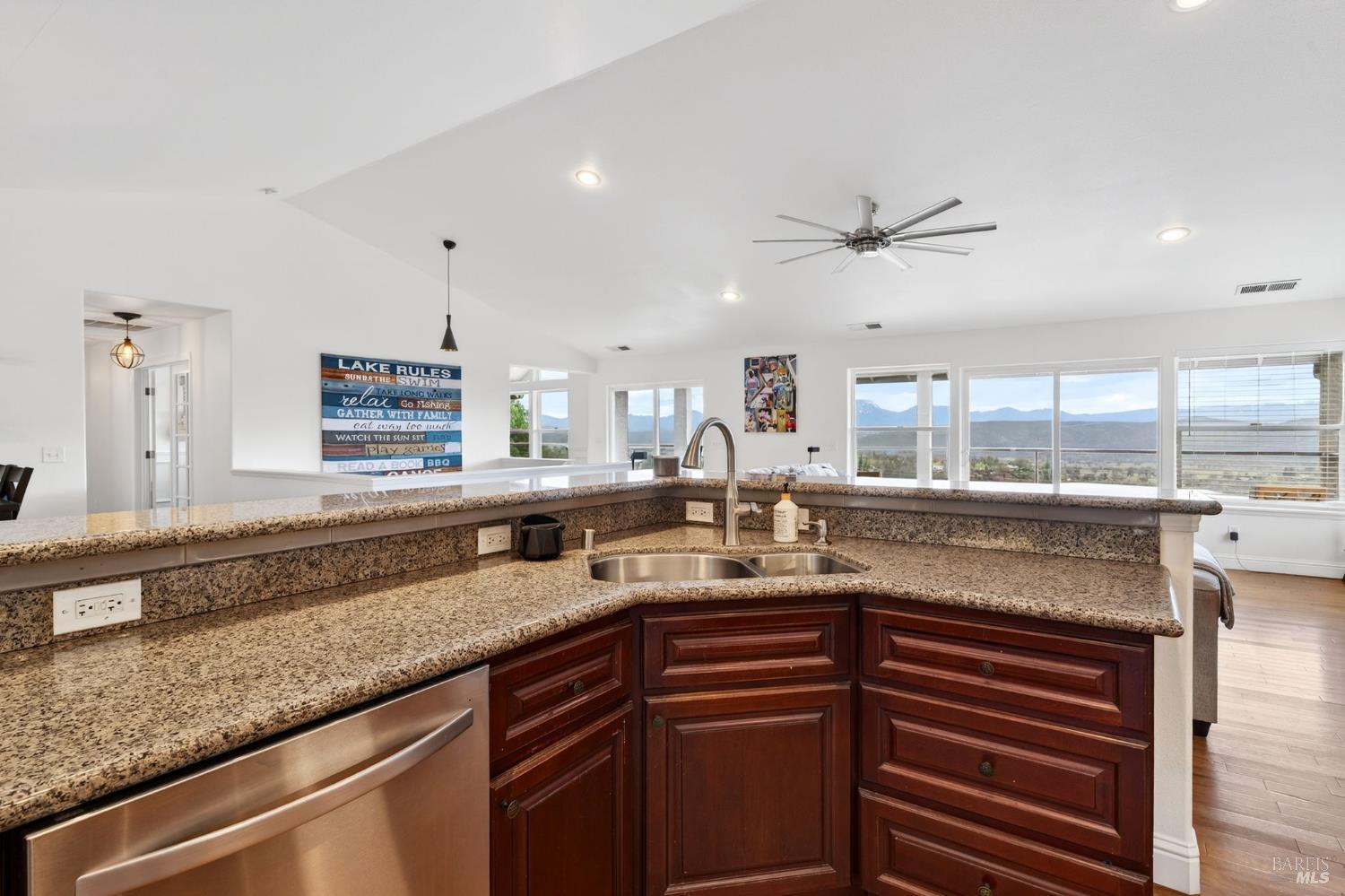 17437 Greenridge Road Hidden Valley Lake, CA 95467 - Photo 31 of 54 a kitchen with granite countertop a sink and a counter space