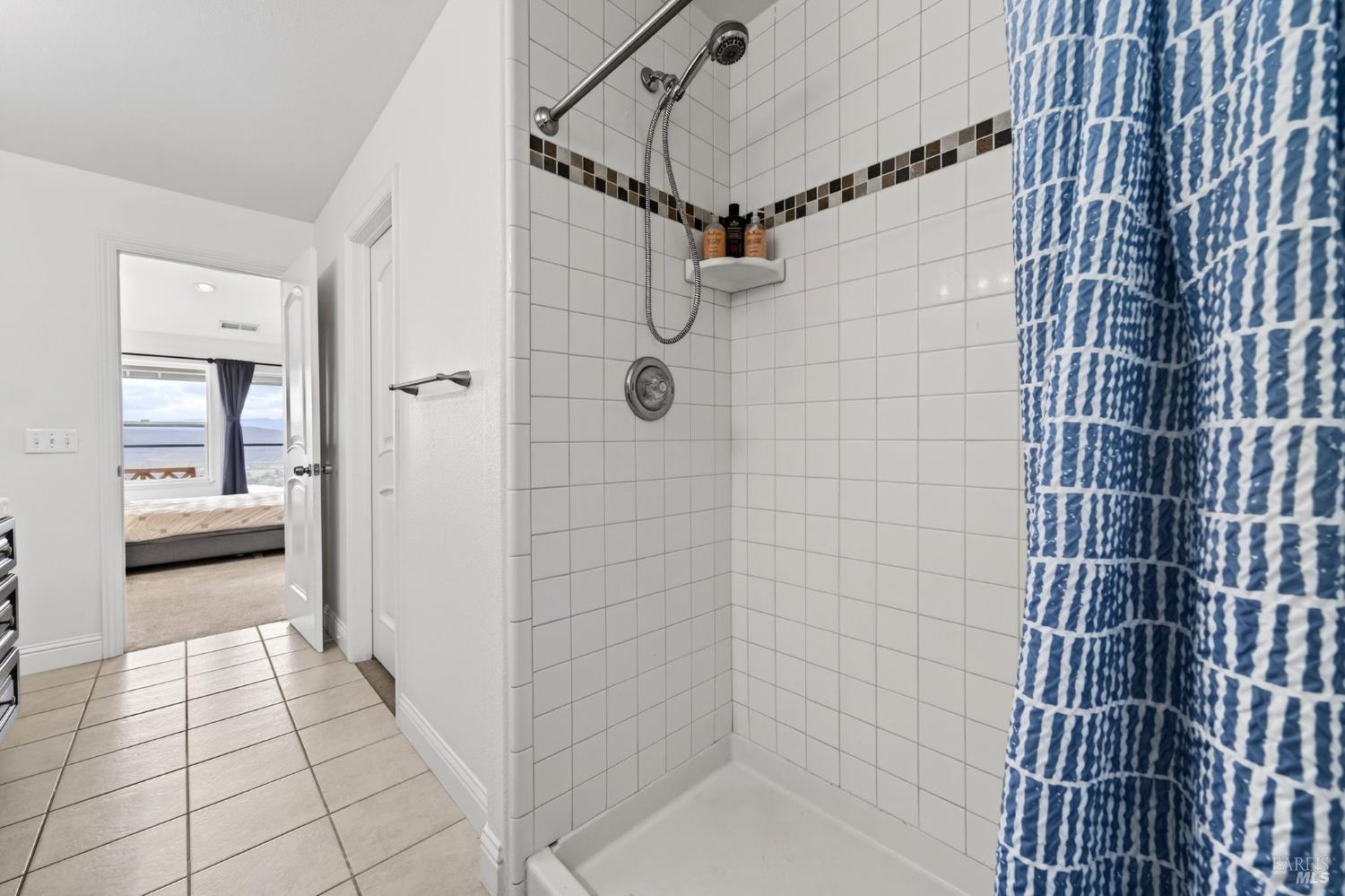 17437 Greenridge Road Hidden Valley Lake, CA 95467 - Photo 38 of 54 a bathroom with a shower