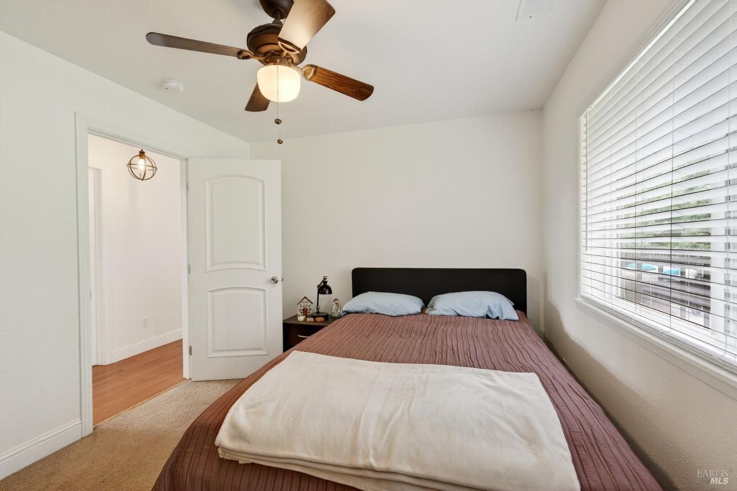 17437 Greenridge Road Hidden Valley Lake, CA 95467 - Photo 41 of 54 a bedroom with a bed and a window