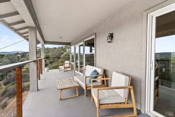 a view of a patio on the deck