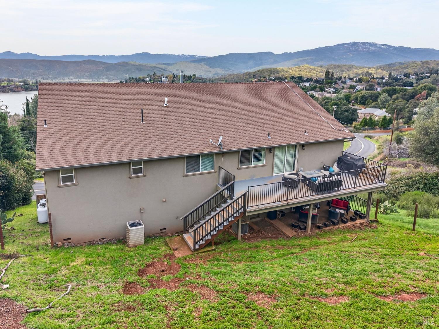 17437 Greenridge Road Hidden Valley Lake, CA 95467 - Photo 52 of 54 an aerial view of a house with swimming pool and a yard