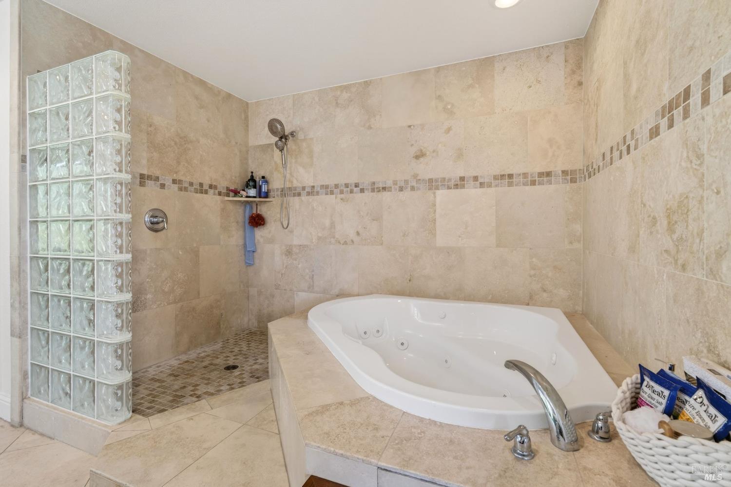 17437 Greenridge Road Hidden Valley Lake, CA 95467 - Photo 10 of 54 a bathroom with a bathtub and shower