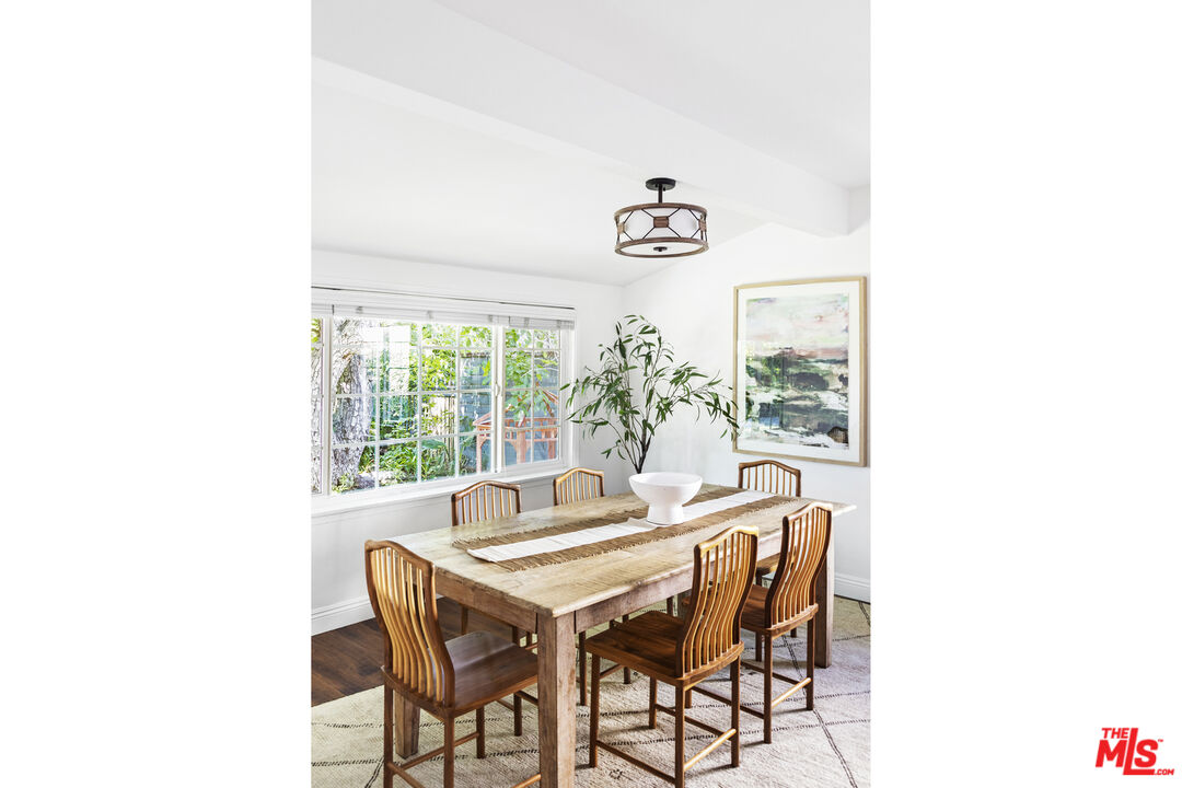13604 Hart Street Van Nuys, CA 91405 - Photo 11 of 43 a dining room with furniture and window