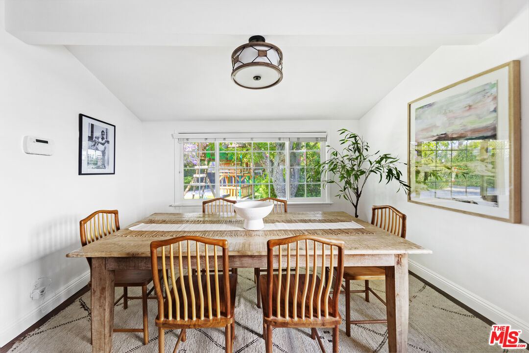 13604 Hart Street Van Nuys, CA 91405 - Photo 13 of 43 a view of a dining room with furniture window and outside view