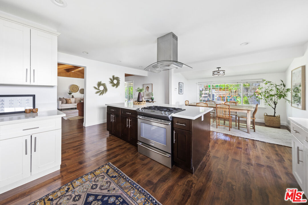 13604 Hart Street Van Nuys, CA 91405 - Photo 16 of 43 a kitchen with granite countertop lots of counter top space