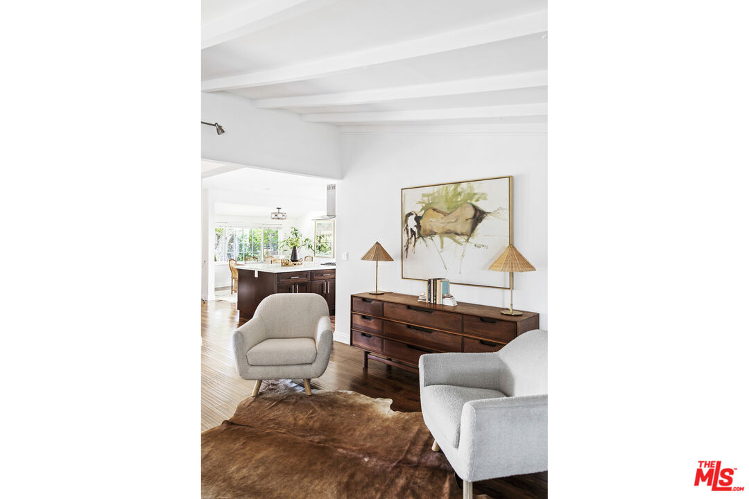 13604 Hart Street Van Nuys, CA 91405 - Photo 22 of 43 a living room with furniture and a window