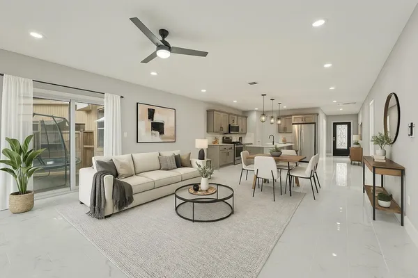 a living room with furniture and a table