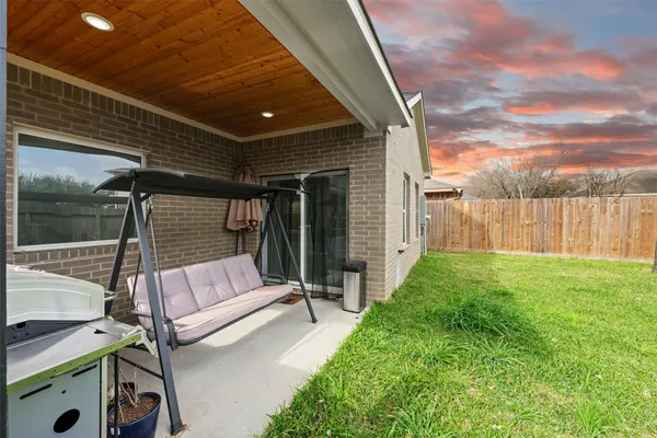 a view of backyard with green space