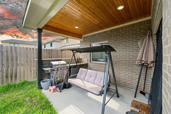 a view of a backyard with a garden