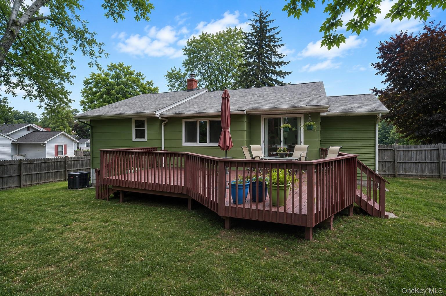 1 Windsor Road Monroe, NY 10950 - Photo 20 of 20 a view of a house with a backyard and deck