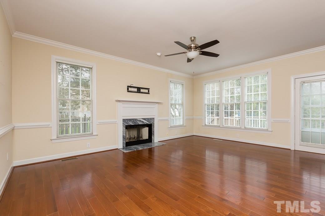 9116 Cub Trail Raleigh, NC 27615 - Photo 3 of 21 The many windows bring in lots of light and make the space cozy.