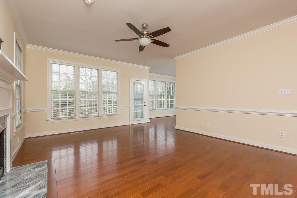 9116 Cub Trail Raleigh, NC 27615 - Photo 4 of 21 Beautiful crown molding and chair rail can be found thoughout most of the home!