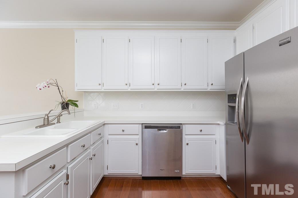 9116 Cub Trail Raleigh, NC 27615 - Photo 6 of 21 Many cabinets plus pantry provide space for all your favorite cookware!