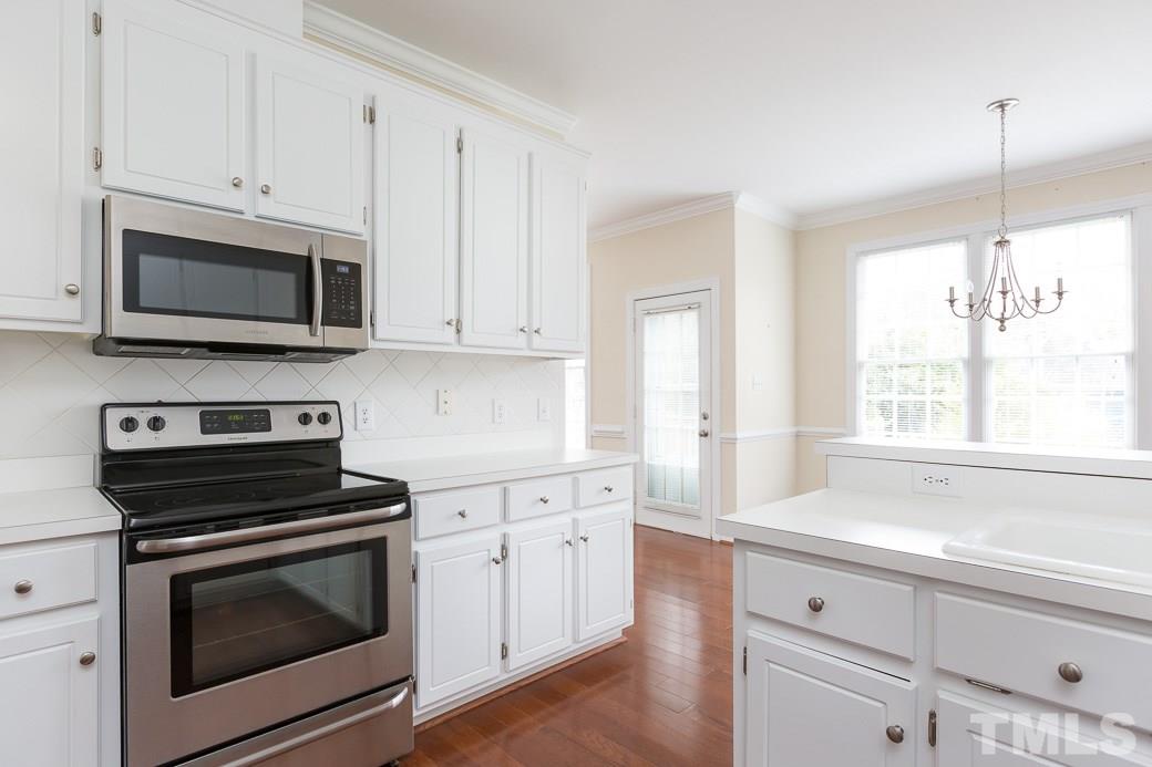 9116 Cub Trail Raleigh, NC 27615 - Photo 7 of 21 Lots of windows keep the space bright and inviting.