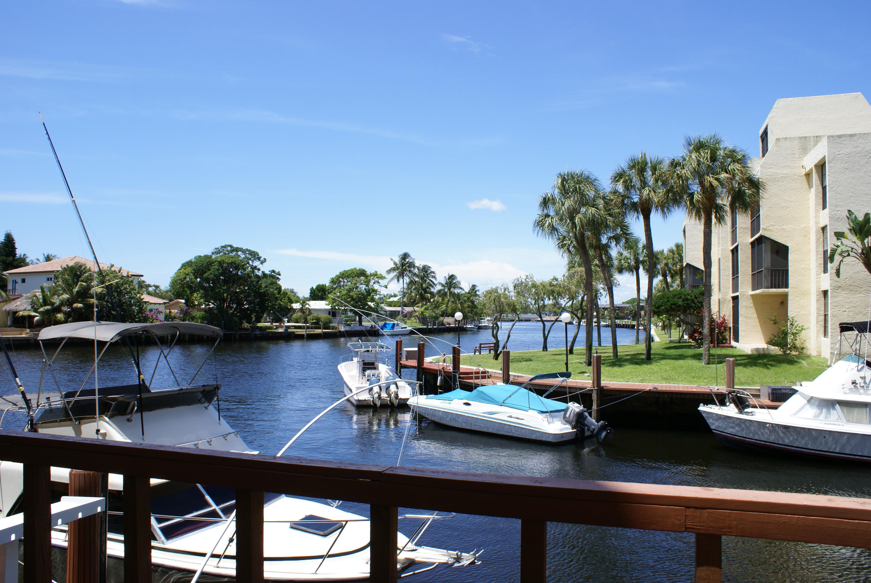 18 Royal Palm Way, Unit 202 Boca Raton, FL 33432 - Photo 36 of 51 a view of a lake from a balcony