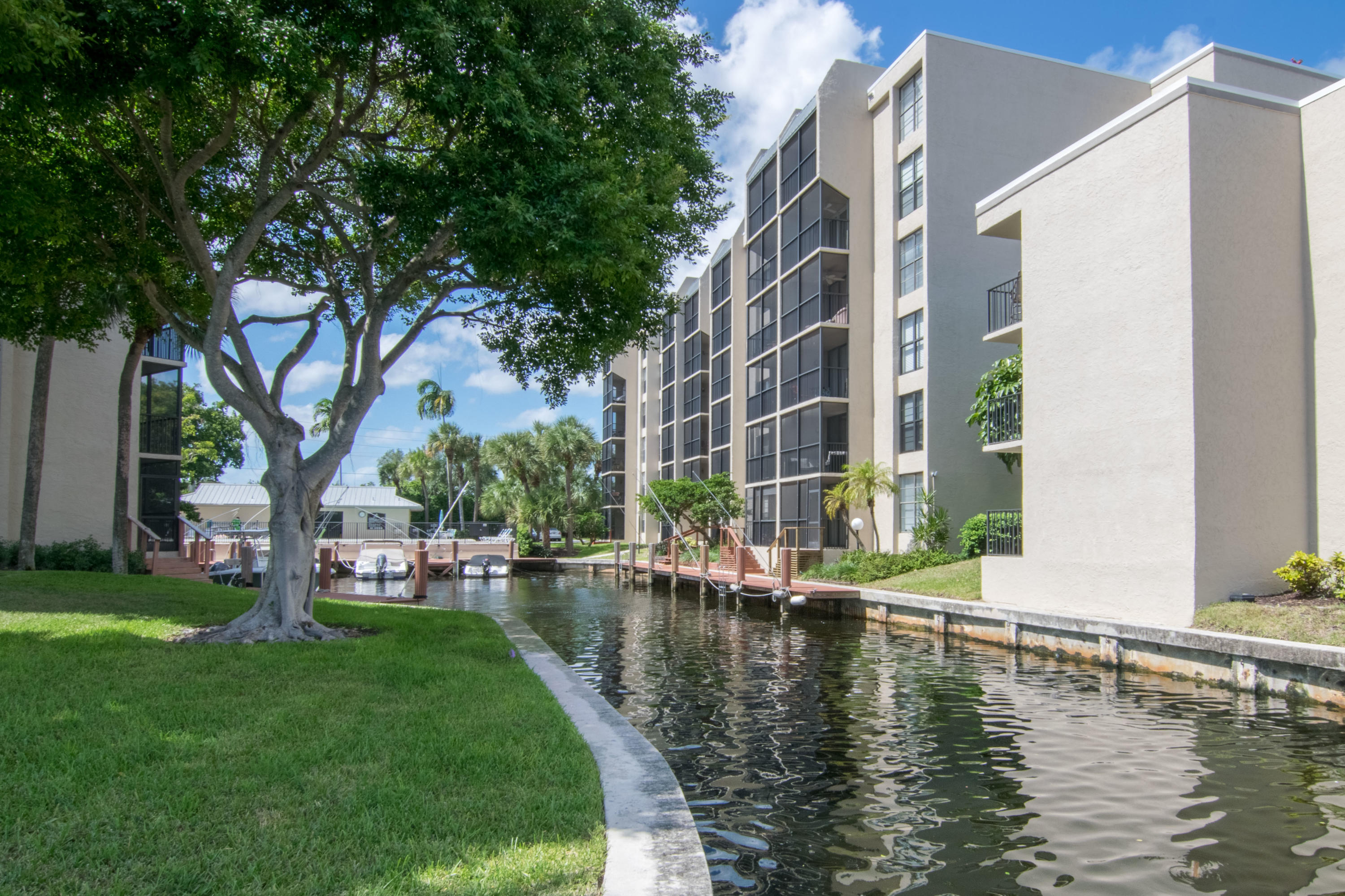 18 Royal Palm Way, Unit 202 Boca Raton, FL 33432 - Photo 45 of 51 a view of a lake with building in the background