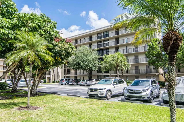 a view of a swimming pool with a lounge chairs