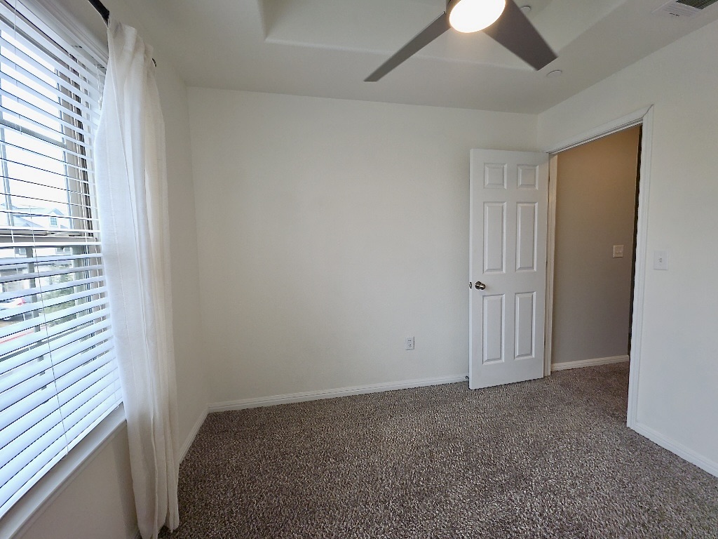 1608 Catalan Road, Unit 302 Austin, TX 78748 - Photo 15 of 21 a view of hallway with window