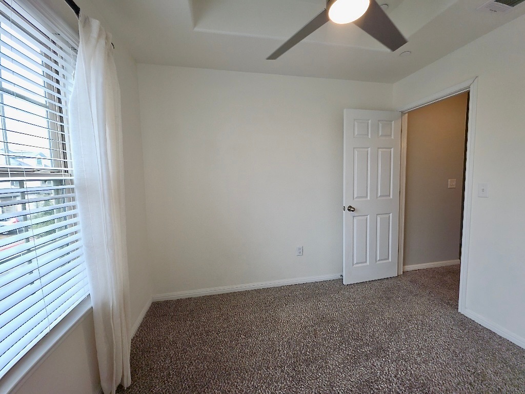 1608 Catalan Road, Unit 302 Austin, TX 78748 - Photo 16 of 21 a view of hallway with window