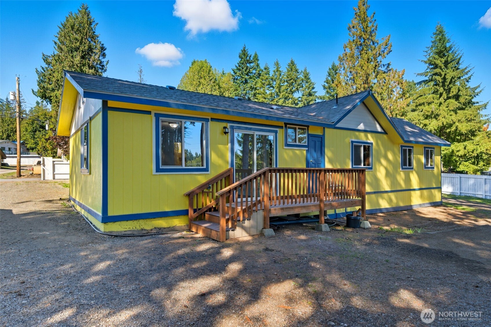 20310 Northwest Cedar Lane Poulsbo, WA 98370 - Photo 11 of 31 a view of a house with a yard