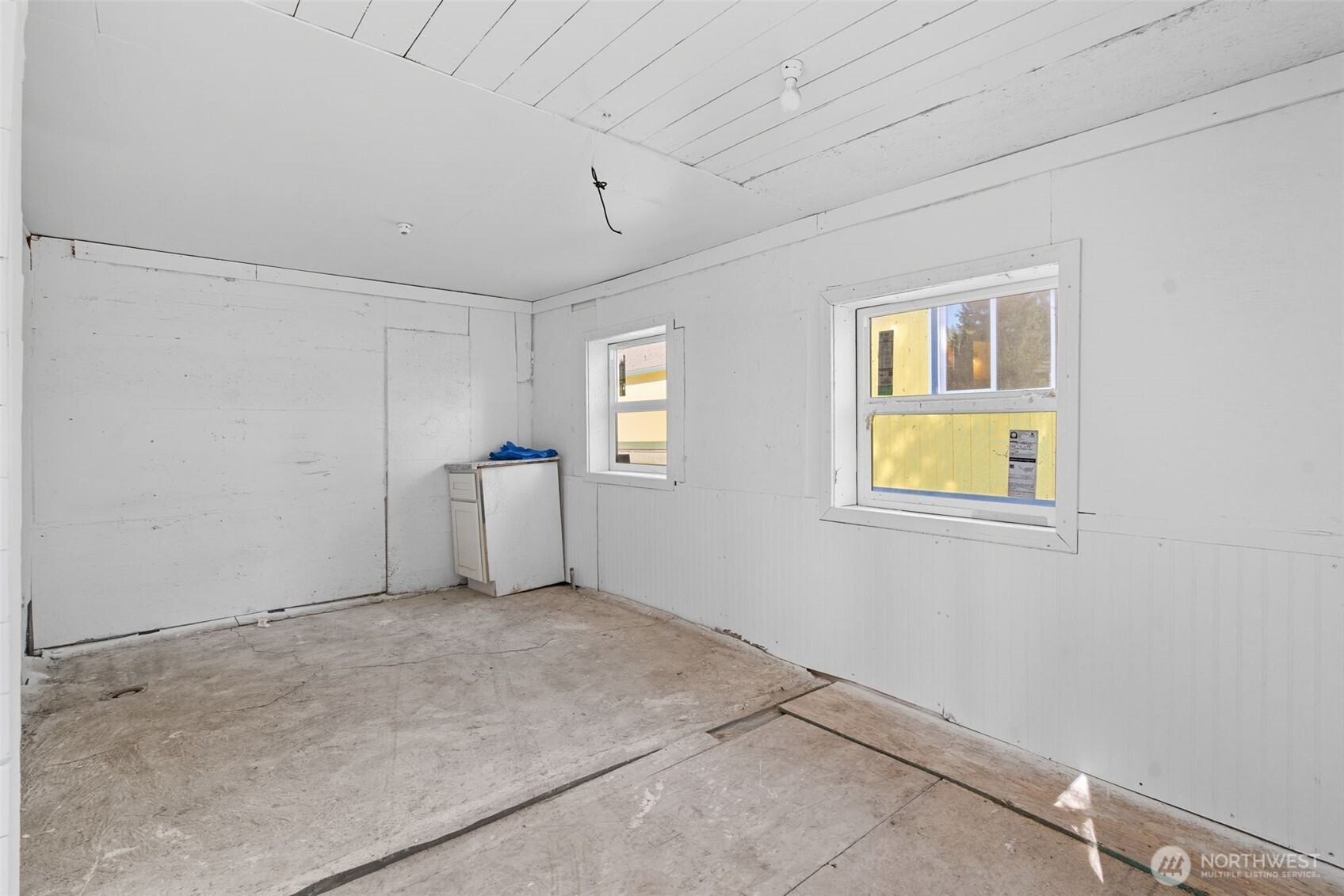 20310 Northwest Cedar Lane Poulsbo, WA 98370 - Photo 12 of 31 a view of empty room with windows