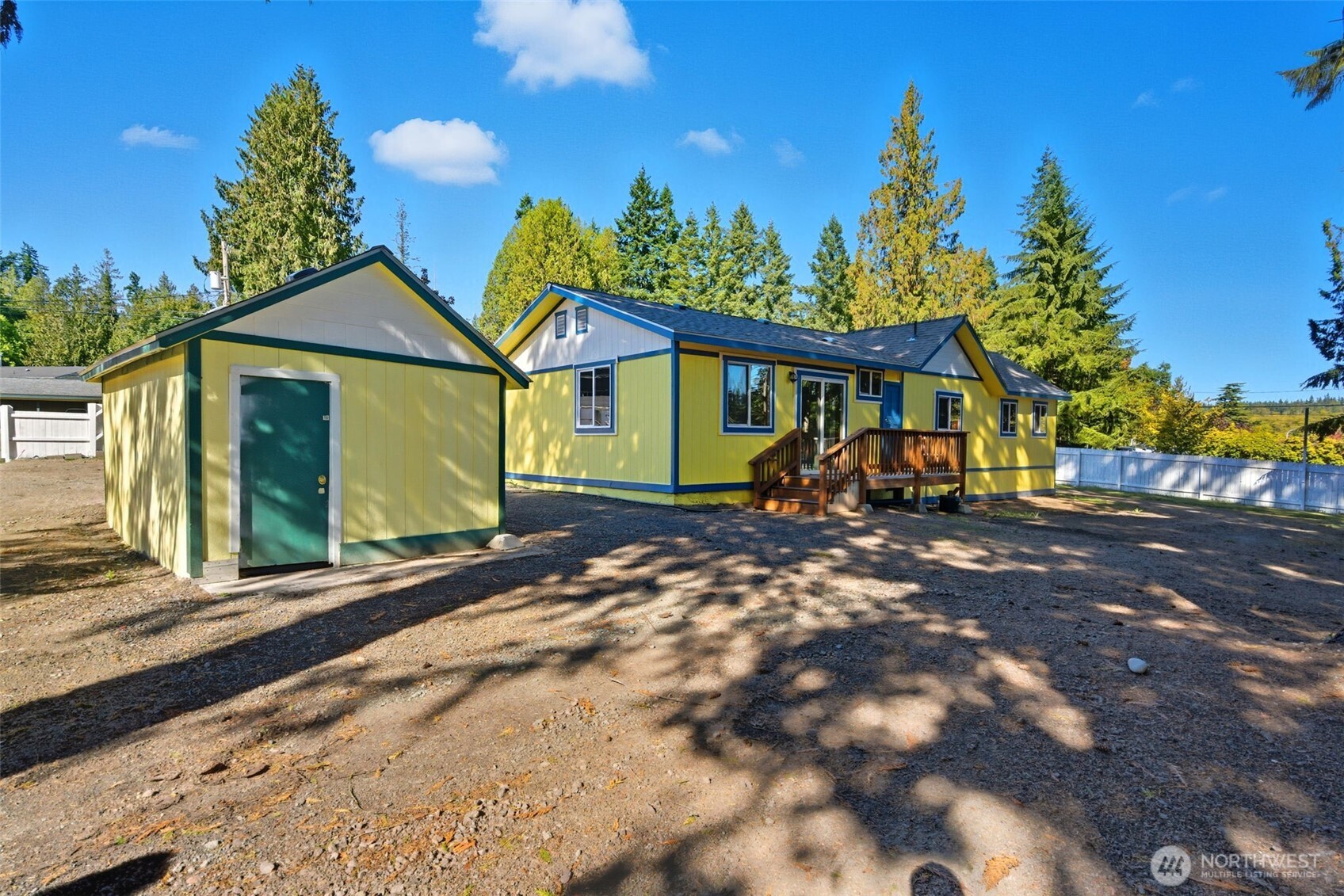 20310 Northwest Cedar Lane Poulsbo, WA 98370 - Photo 14 of 31 a front view of a house with garden