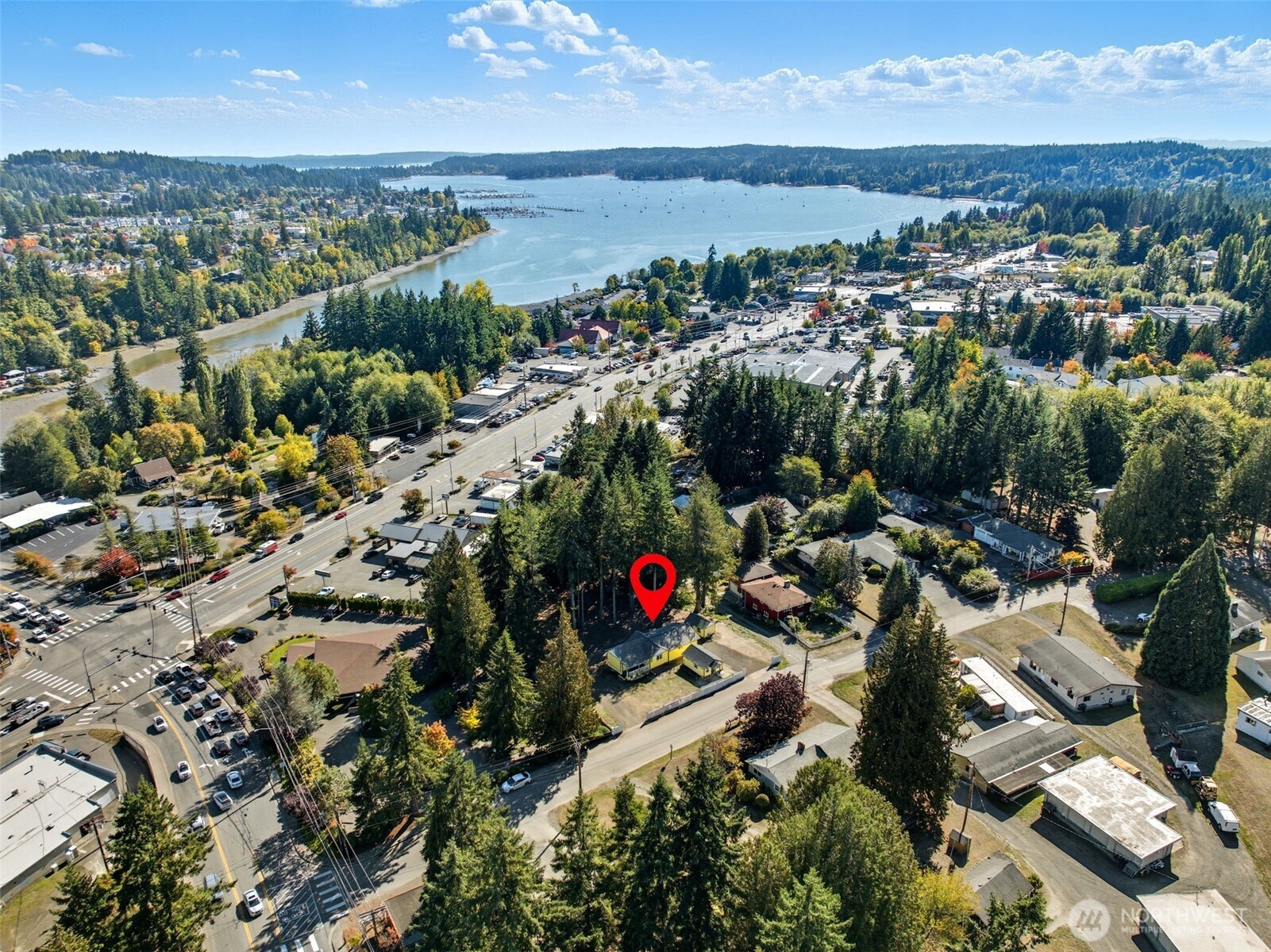 20310 Northwest Cedar Lane Poulsbo, WA 98370 - Photo 20 of 31 an aerial view of residential houses with outdoor space and trees