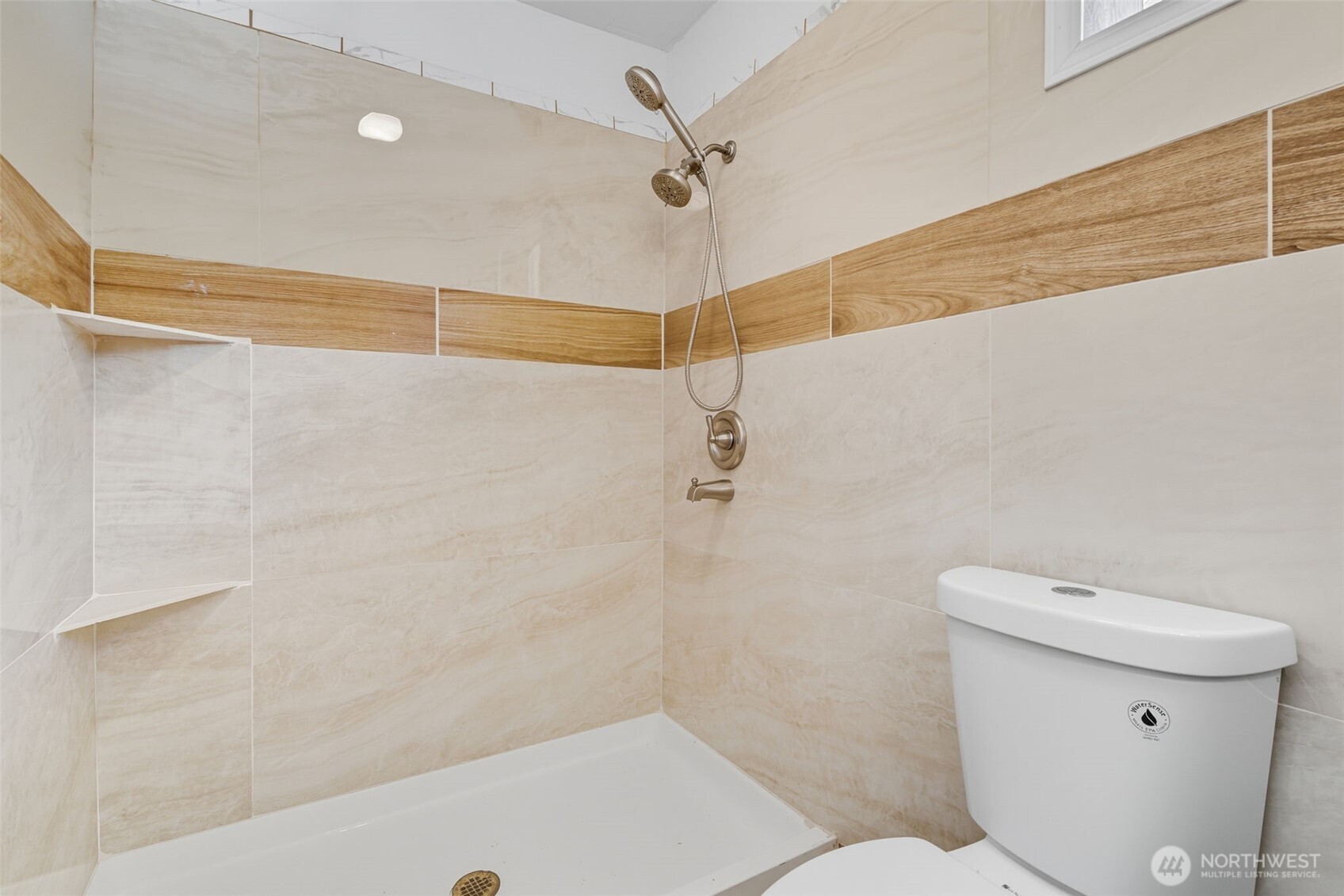 20310 Northwest Cedar Lane Poulsbo, WA 98370 - Photo 24 of 31 a bathroom with a toilet and a shower