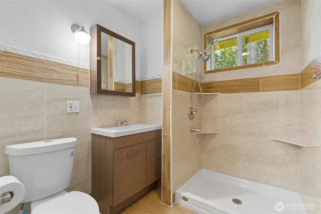 a white refrigerator freezer sitting inside of a kitchen