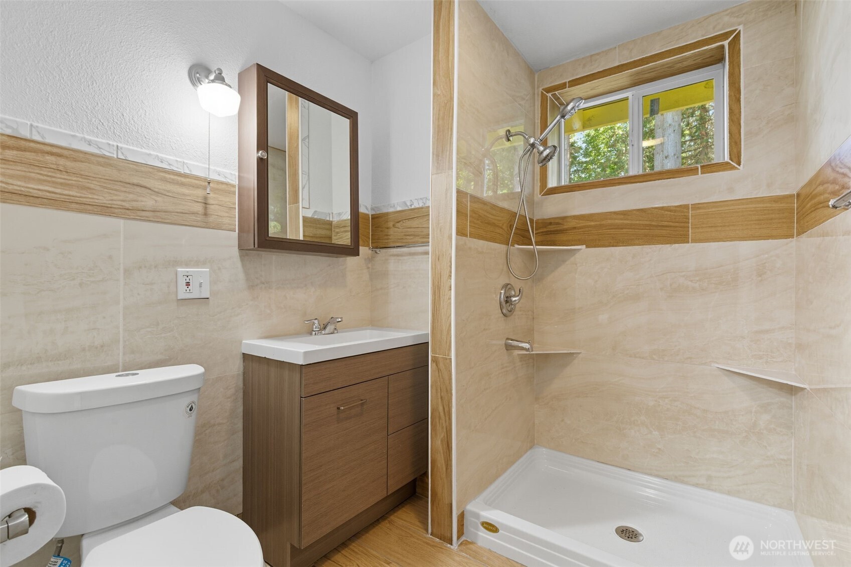 20310 Northwest Cedar Lane Poulsbo, WA 98370 - Photo 25 of 31 a bathroom with a sink toilet and shower