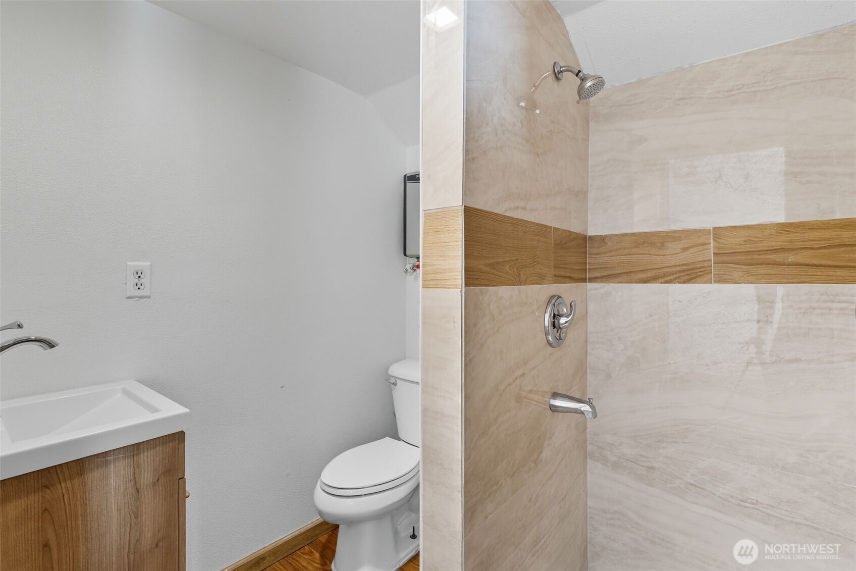 20310 Northwest Cedar Lane Poulsbo, WA 98370 - Photo 27 of 31 a bathroom with a sink and a toilet