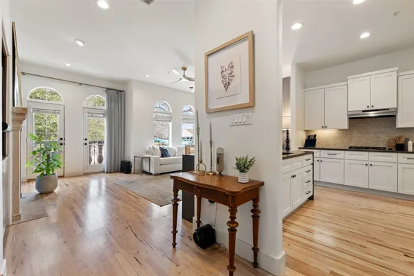 a kitchen with sink and cabinets