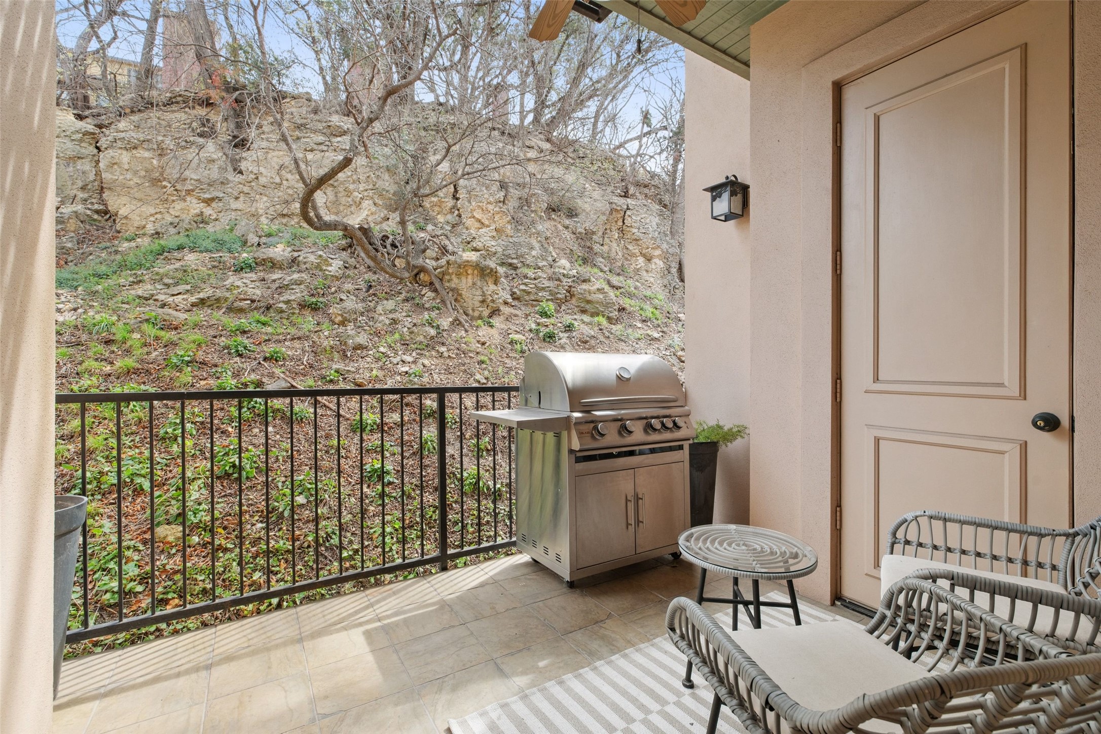 1529 Barton Springs Road, Unit 2 Austin, TX 78704 - Photo 18 of 40 a balcony with wooden floor and outdoor seating