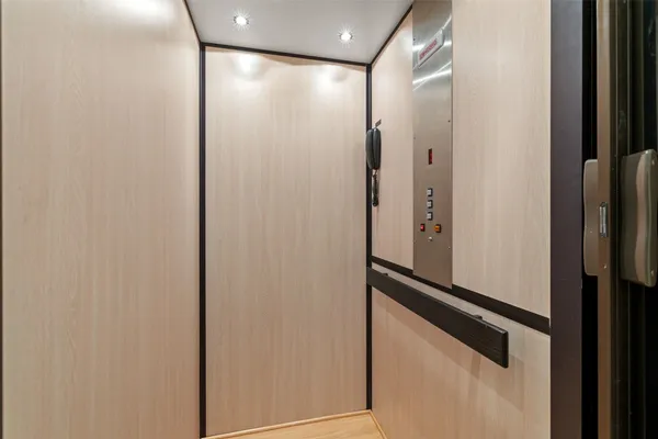 a bedroom with a bed and a fireplace