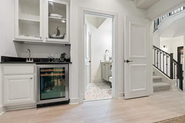a bathroom with a sink a toilet and vanity