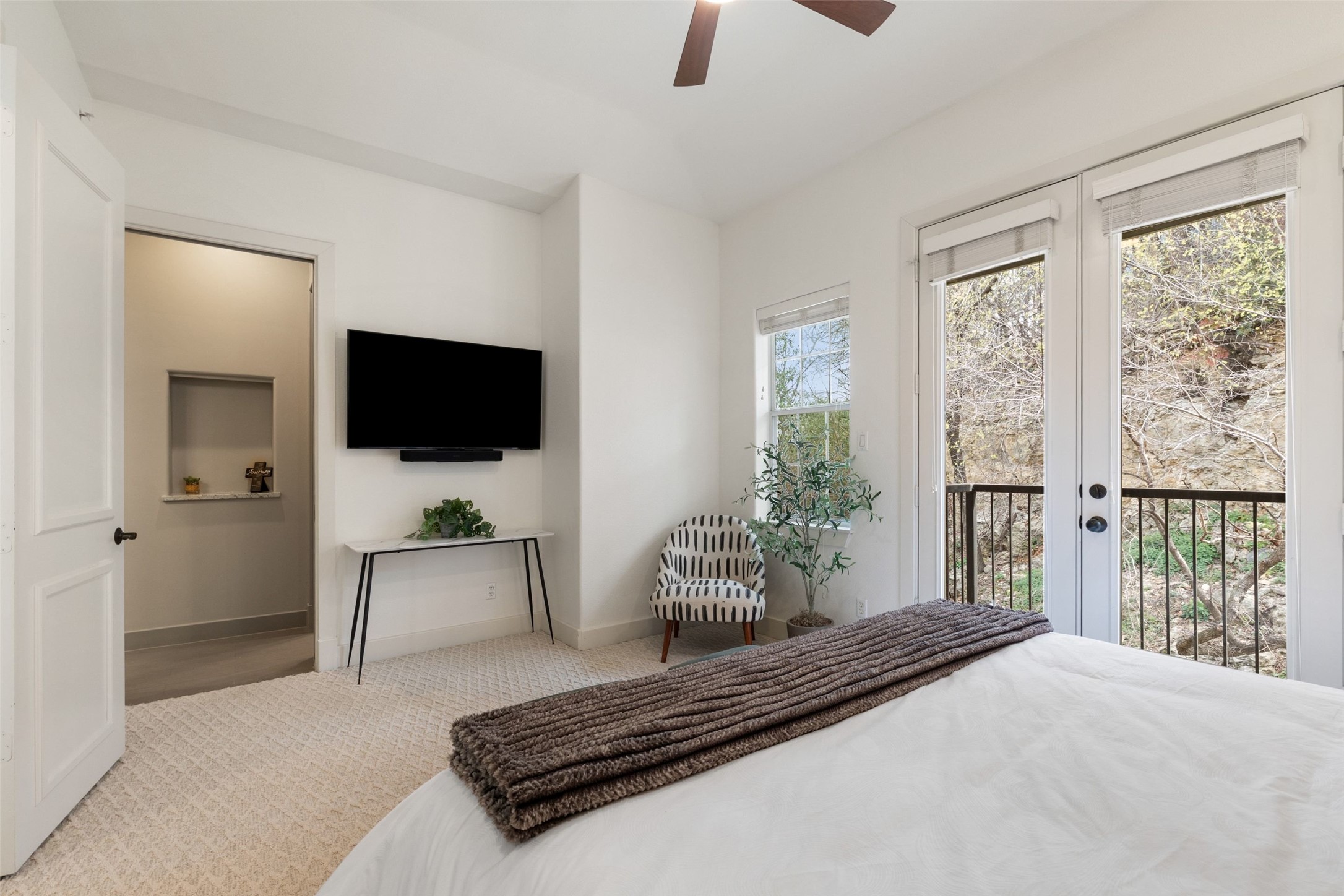 1529 Barton Springs Road, Unit 2 Austin, TX 78704 - Photo 27 of 40 a living room with furniture and a flat screen tv