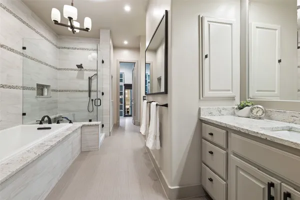 a utility room with sink dryer and washer