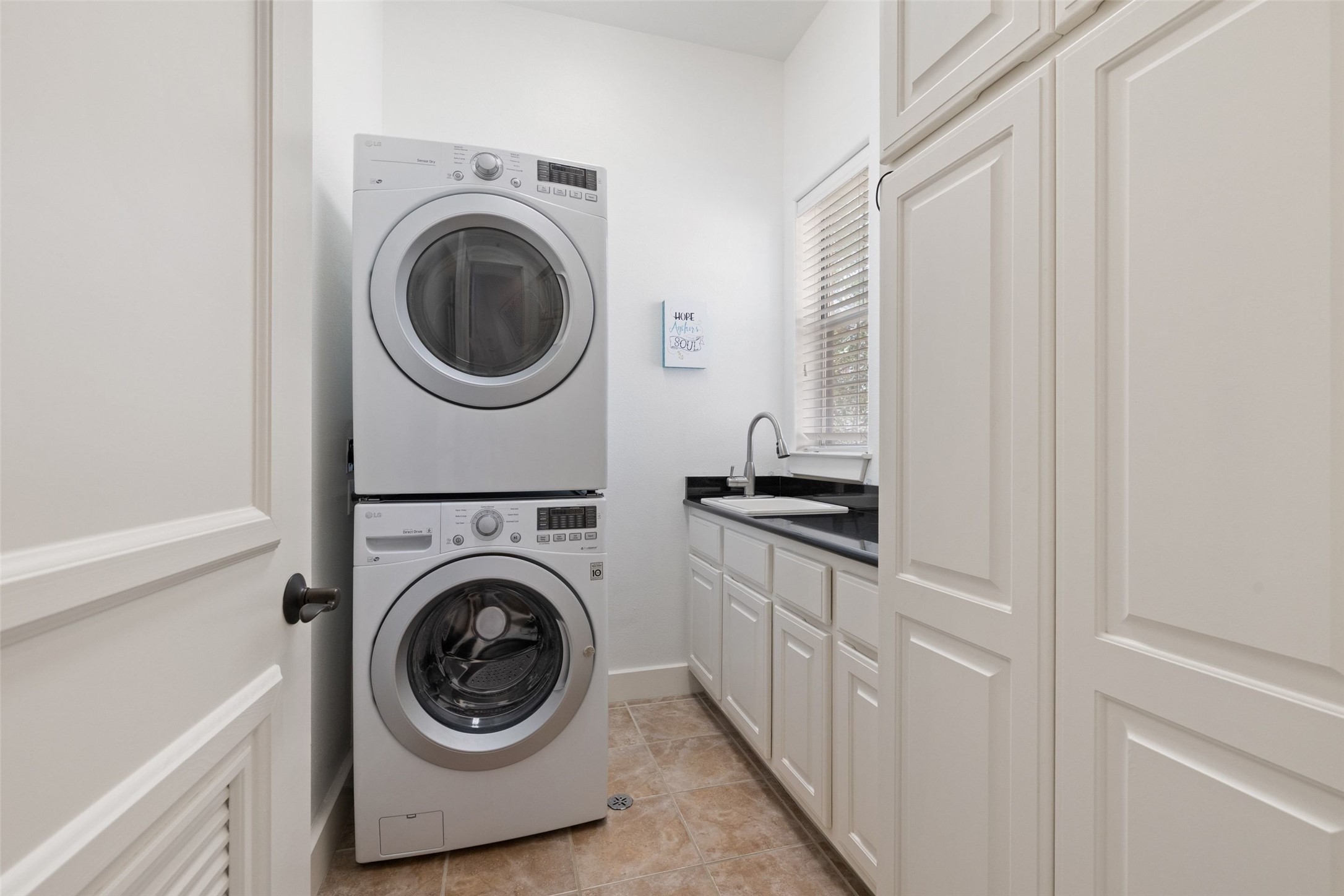 1529 Barton Springs Road, Unit 2 Austin, TX 78704 - Photo 30 of 40 a utility room with sink dryer and washer