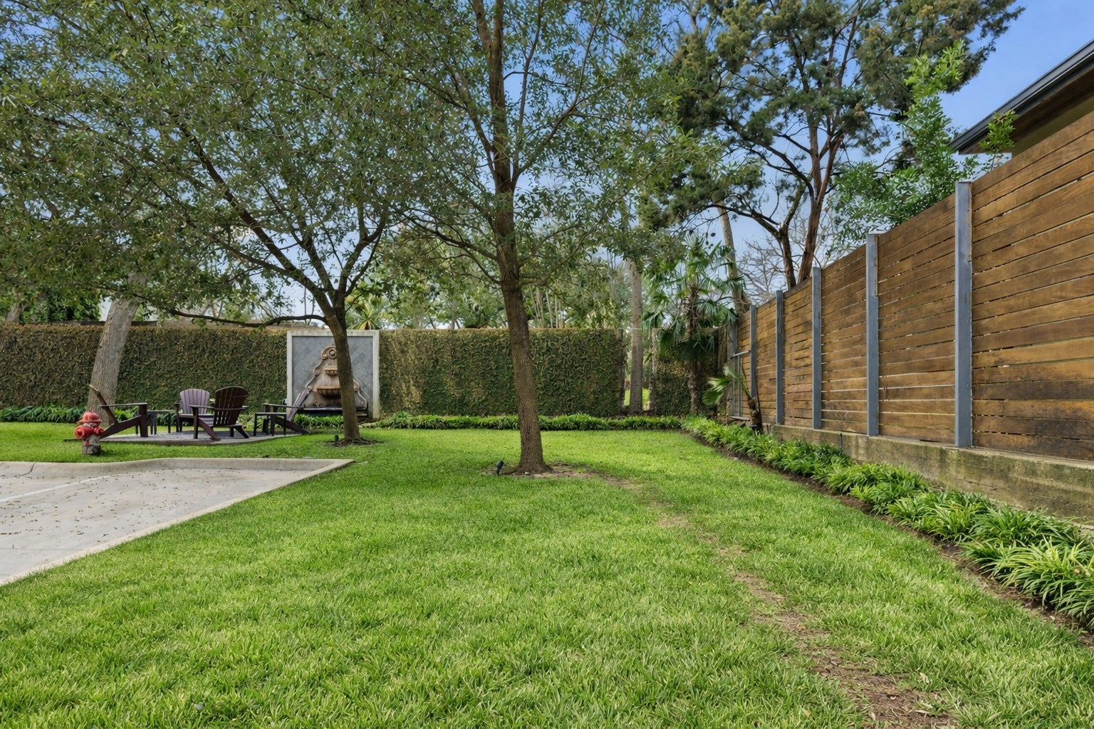 1529 Barton Springs Road, Unit 2 Austin, TX 78704 - Photo 36 of 40 a view of a garden with a slide