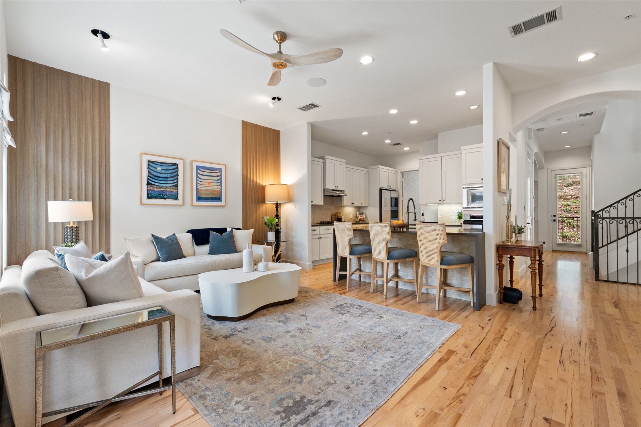 1529 Barton Springs Road, Unit 2 Austin, TX 78704 - Photo 4 of 40 a living room with lots of furniture and kitchen view