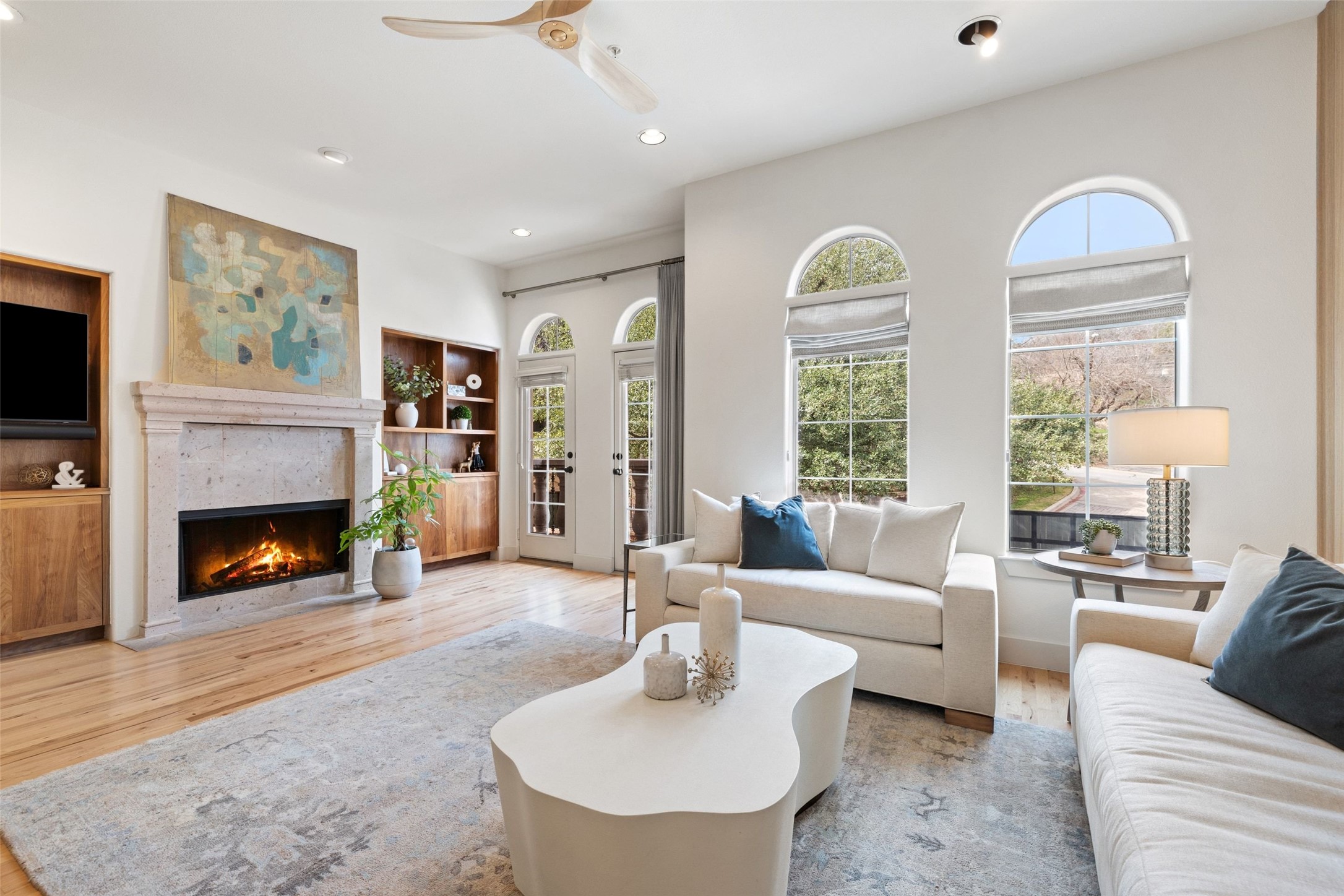 1529 Barton Springs Road, Unit 2 Austin, TX 78704 - Photo 6 of 40 a living room with furniture and a fireplace