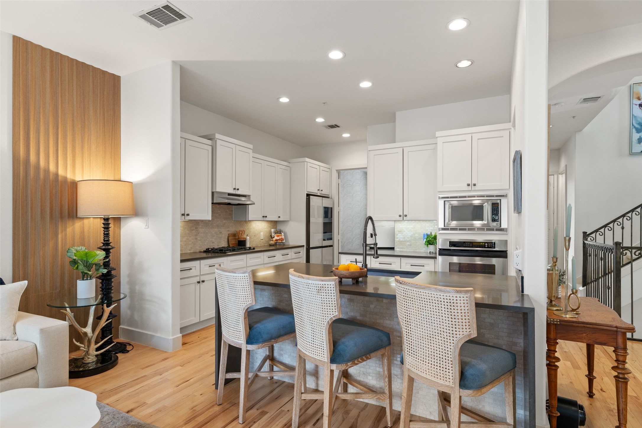 1529 Barton Springs Road, Unit 2 Austin, TX 78704 - Photo 10 of 40 a kitchen with stainless steel appliances a stove a sink a microwave a refrigerator and cabinets