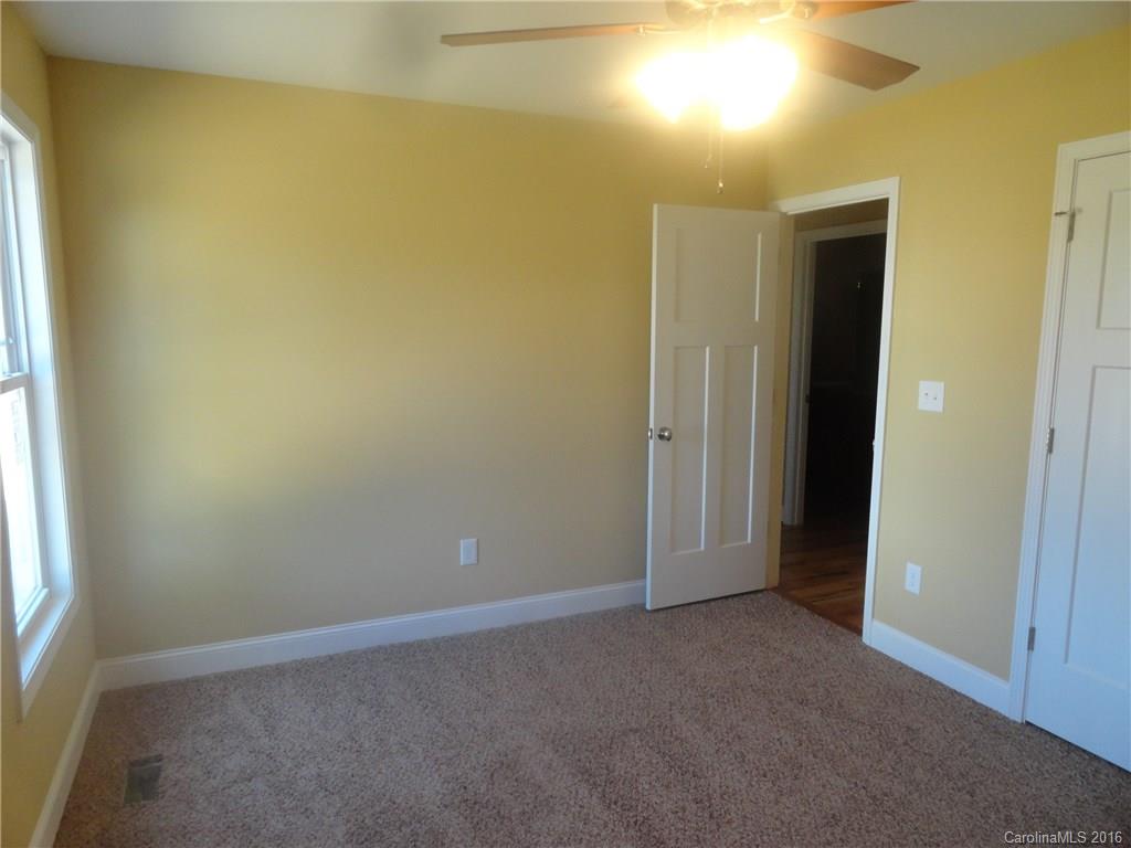 4759 Kemp Dellinger Road, Unit 1 Maiden, NC 28650 - Photo 12 of 24 an empty room with windows and entrance