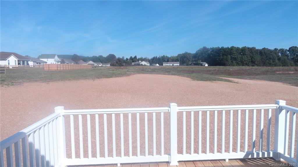 4759 Kemp Dellinger Road, Unit 1 Maiden, NC 28650 - Photo 23 of 24 a balcony with view of lake