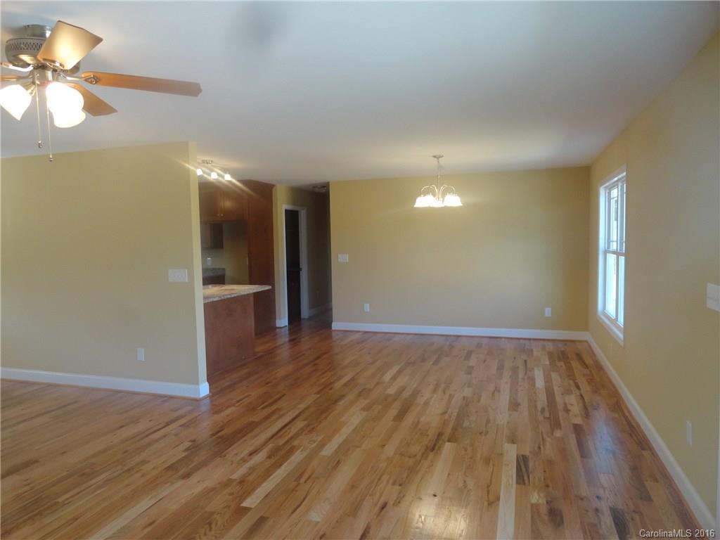 4759 Kemp Dellinger Road, Unit 1 Maiden, NC 28650 - Photo 6 of 24 a view of empty room with wooden floor